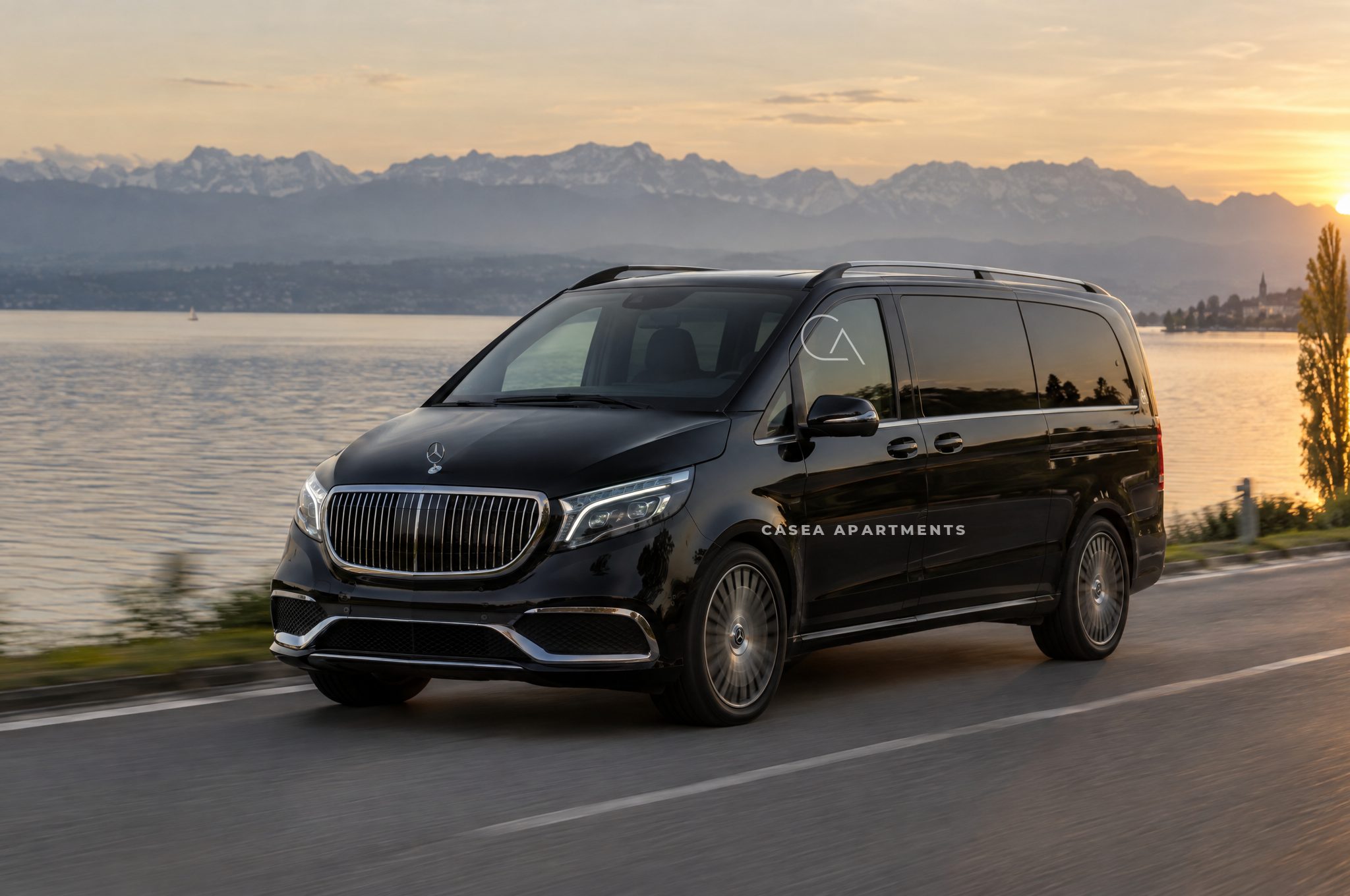 Schwarze Mercedes-Maybach V-Klasse auf der Uferstraße am Bodensee, im Hintergrund See und Alpen
